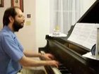 r/gaming - What happens when you give a Mario piano score to someone who's never heard it in his life? Awesomeness.